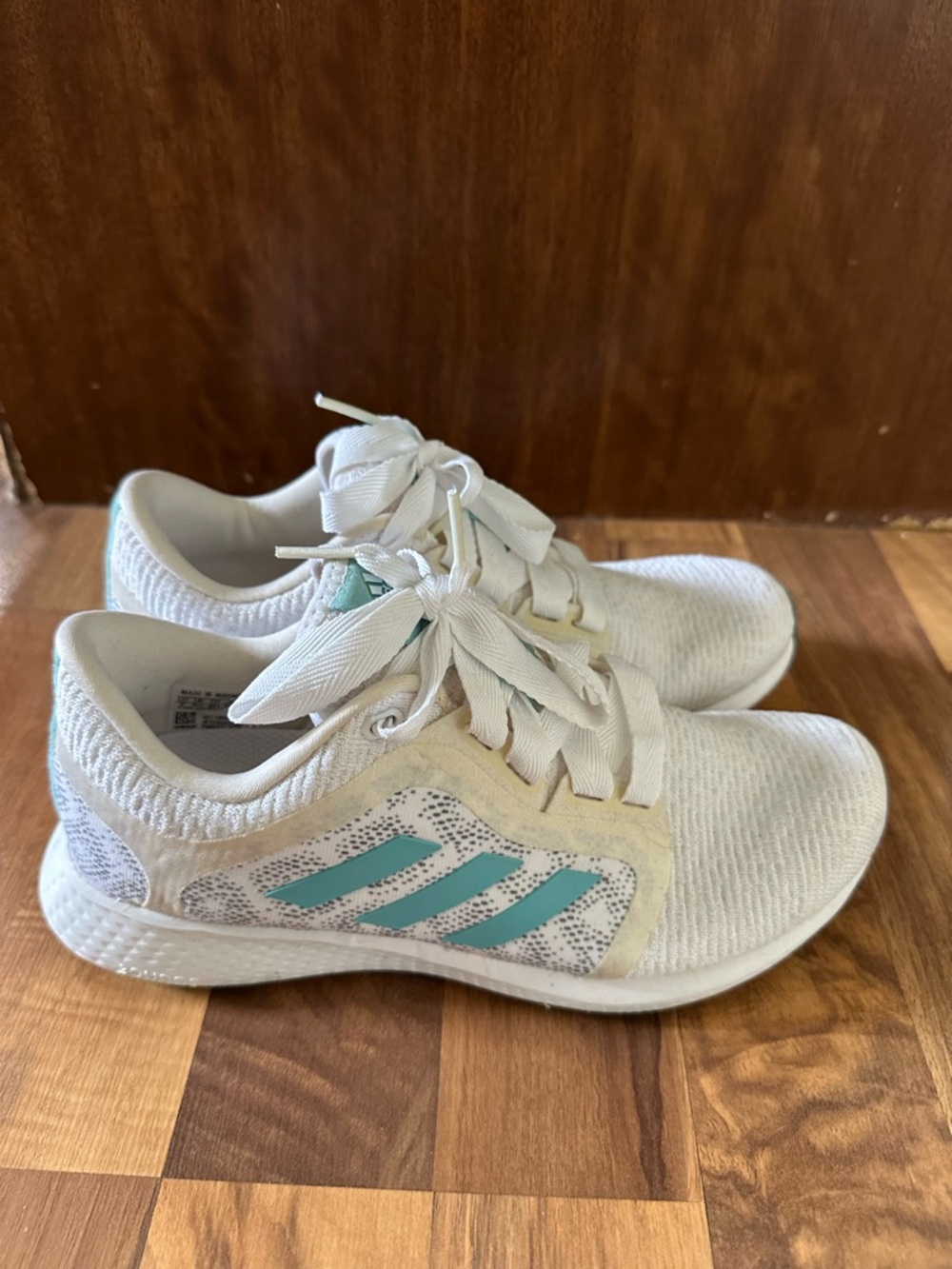 adidas Women's White Knit Athletic Shoes with Teal Three-Stripes